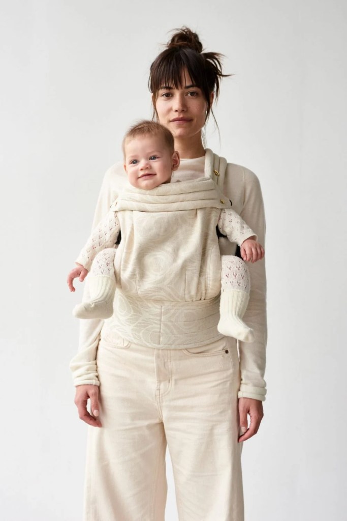Image showing mother with baby in Artipoppe Zeitgeist carrier with baby facing outwards