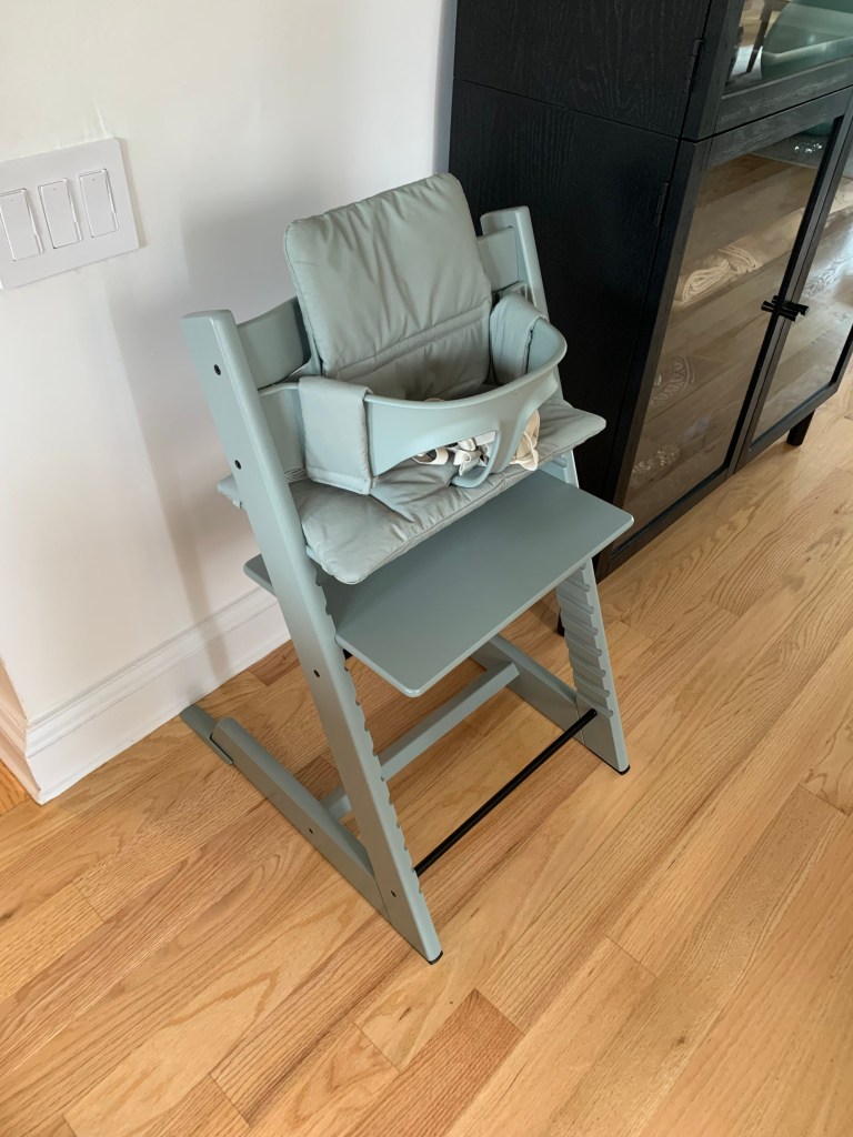 Stokke Tripp Trapp in Glacier Green in a New York City apartment pushed against a wall 