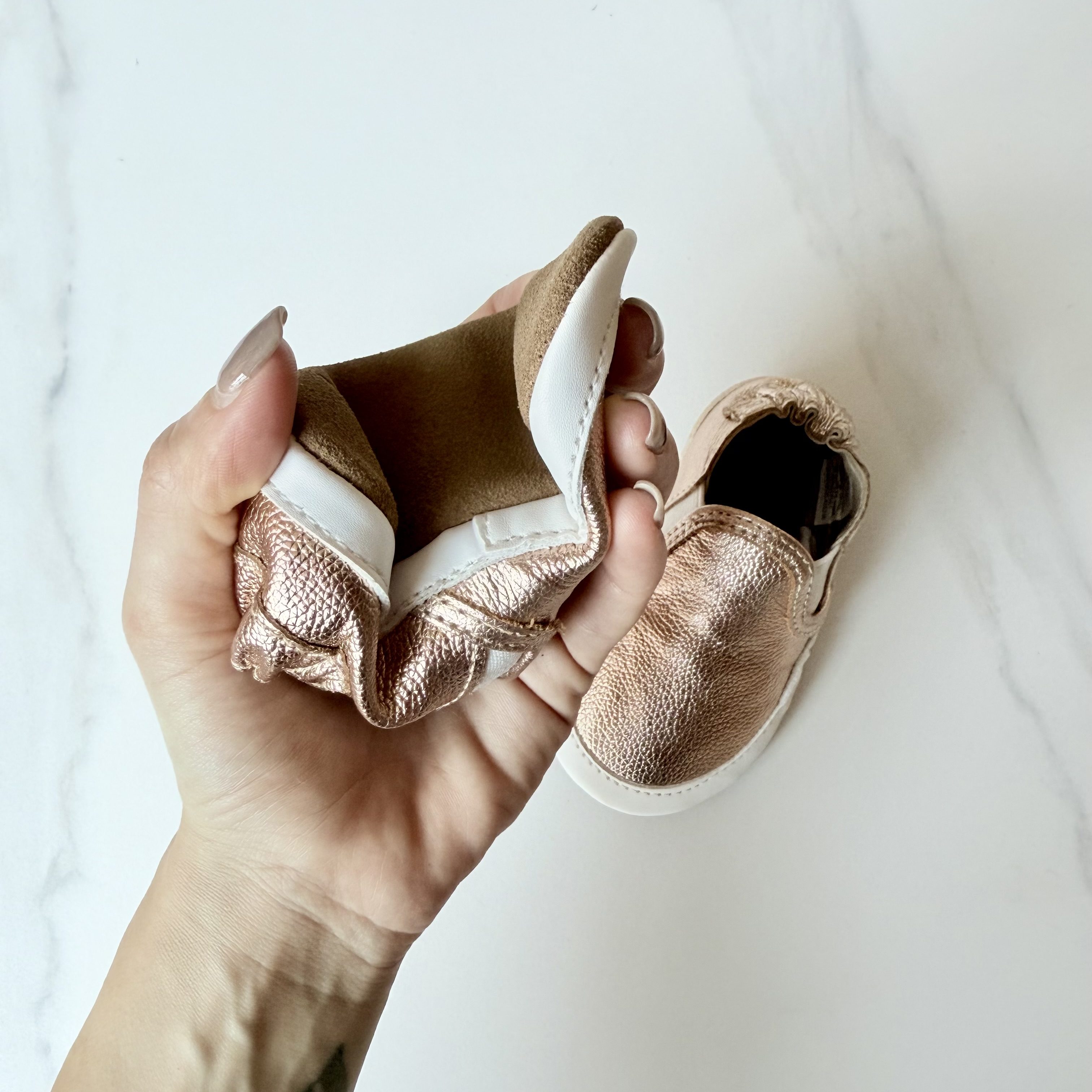 Image of flexibility Robeez Soft Sole Crib Shoes in Rose Gold