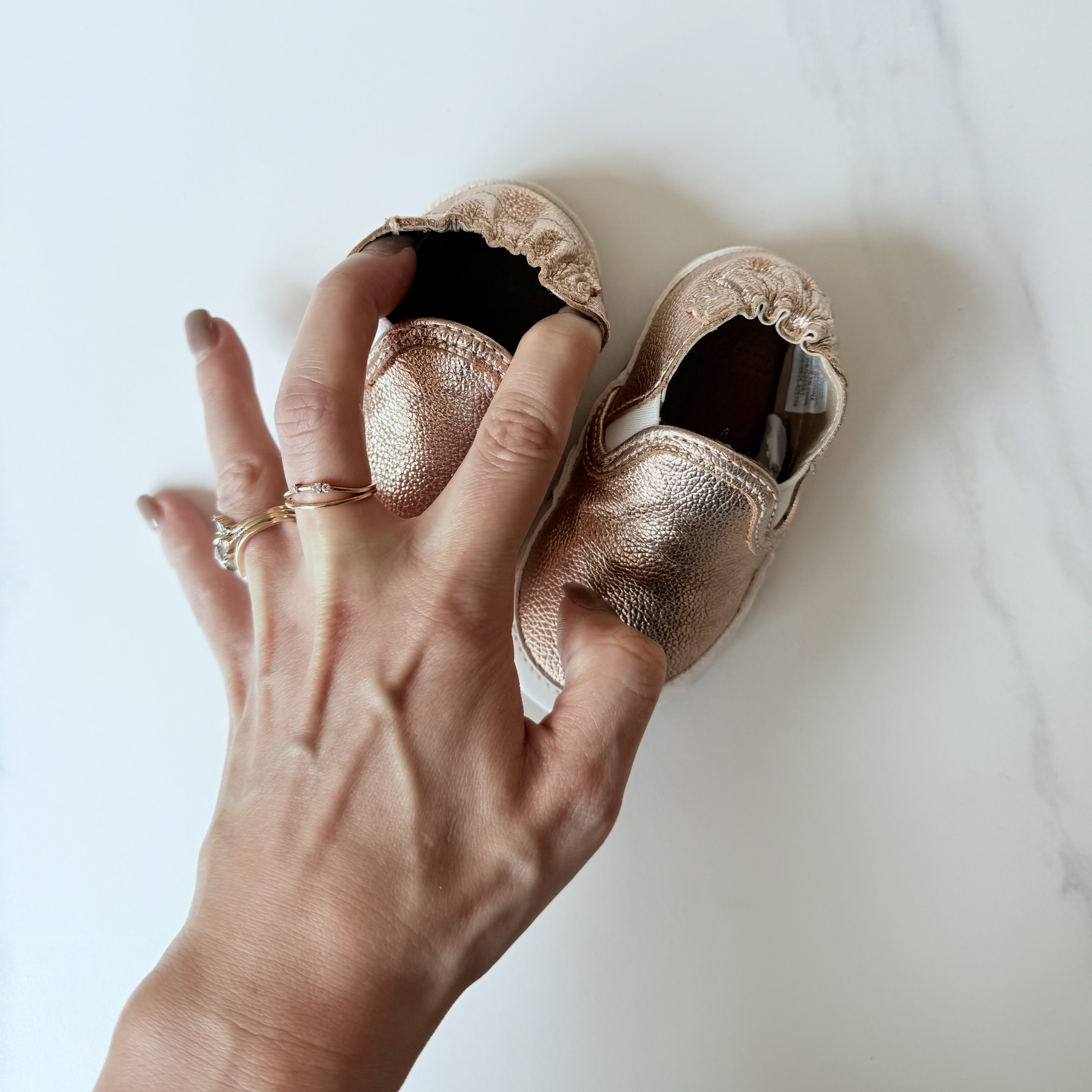 Image showing restricted opening of  Robeez Soft Sole Crib Shoes in Rose Gold